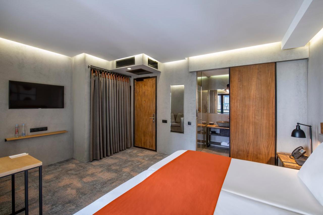 Iota Hotel Тбилиси Екстериор снимка A room at the hotel